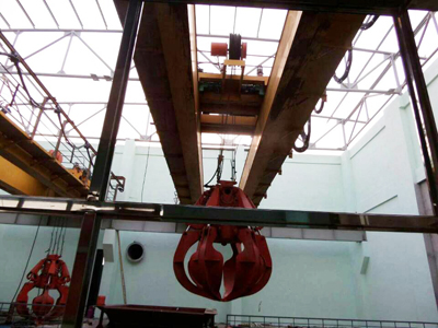 自运行抓斗ag九游会j9集团机的智能控制